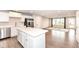 Modern kitchen with white cabinetry, quartz countertops, stainless steel appliances, and an open layout at 4179 Hume Ave, Plainfield, IN 46168