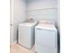 Laundry room featuring a washer, dryer, and shelving for storage at 4179 Hume Ave, Plainfield, IN 46168