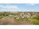 Aerial view of the neighborhood with green fields and houses in the background at 431 W Main St, Lizton, IN 46149