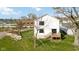 View of the back exterior of the home showing the deck and backyard at 431 W Main St, Lizton, IN 46149