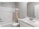 Clean bathroom features a shower, toilet, and a modern vanity with sink and countertop at 432 Bluestem Ln, Whiteland, IN 46184