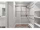 Walk-in closet featuring shelving and a metal rod for hanging clothing at 432 Bluestem Ln, Whiteland, IN 46184