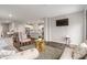 Inviting living room open to the kitchen, featuring stylish decor and a comfortable seating area at 432 Bluestem Ln, Whiteland, IN 46184