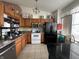 Well-lit kitchen boasts modern appliances, ample cabinetry, and functional countertops with lots of storage at 4320 Lucky Ct, Indianapolis, IN 46203