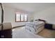 Bedroom with window, carpet, and dresser at 5139 Kingswood Dr, Carmel, IN 46033