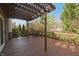 Covered deck with seating and shade offers a relaxing outdoor space for entertaining or enjoying the view at 5139 Kingswood Dr, Carmel, IN 46033