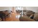 Comfortable living room with hardwood floors, neutral decor, and ample seating at 5139 Kingswood Dr, Carmel, IN 46033