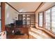 Bright office featuring built-in shelves, a large desk, and a great view at 5139 Kingswood Dr, Carmel, IN 46033