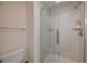 The bathroom features a glass shower with tiled walls and a built-in shelf at 5139 Kingswood Dr, Carmel, IN 46033