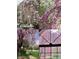 Photo collage of a yard with weeping cherry trees in different seasons at 5139 Kingswood Dr, Carmel, IN 46033