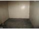 A storage room with walls and concrete floors at 5657 E Fall Creek Pkwy N Dr, Indianapolis, IN 46226