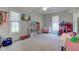 A bedroom with beige carpet and furnishings at 6170 Shelbyville Rd, Indianapolis, IN 46237