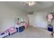 A bedroom with beige carpet and furnishings at 6170 Shelbyville Rd, Indianapolis, IN 46237