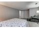 Bedroom with an accent chair, ottoman, carpet, and plenty of room at 6170 Shelbyville Rd, Indianapolis, IN 46237