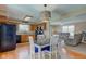 Cozy dining area adjacent to the kitchen and living room creating an inclusive space at 6170 Shelbyville Rd, Indianapolis, IN 46237
