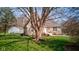 Charming stone home with mature trees at 6170 Shelbyville Rd, Indianapolis, IN 46237