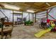 Spacious interior of shed provides ample storage and workspace for projects at 6170 Shelbyville Rd, Indianapolis, IN 46237