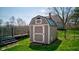 This well-maintained storage shed offers secure backyard storage and compliments the home's exterior at 6170 Shelbyville Rd, Indianapolis, IN 46237