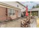 Covered back patio featuring comfortable seating, a grill, and ample space for relaxation and outdoor enjoyment at 6272 Turnbridge Dr, Avon, IN 46123