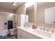 Bathroom with double sink vanity with modern fixtures, tile floor, and a shower at 6272 Turnbridge Dr, Avon, IN 46123