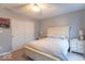 Bright bedroom features neutral walls, carpet and a ceiling fan with lighting at 6272 Turnbridge Dr, Avon, IN 46123