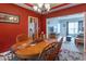 Inviting dining area adjacent to a living room showcases a wooden table at 6272 Turnbridge Dr, Avon, IN 46123