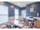 Stylish office space with natural light from large windows and a functional workspace at 6272 Turnbridge Dr, Avon, IN 46123