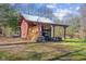 Utility shed with wood storage at 6351 Dixon Rd, Columbus, IN 47201