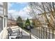 Relaxing outdoor balcony offers a comfortable seating area and pleasant views of the surrounding neighborhood at 6379 Fairfield St, Whitestown, IN 46075