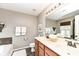 Well-lit bathroom featuring a dual-sink vanity, ample counter space, and stylish fixtures at 6379 Fairfield St, Whitestown, IN 46075