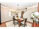 Inviting dining room with a rustic wood table and elegant decor, perfect for Gathering gatherings at 6379 Fairfield St, Whitestown, IN 46075