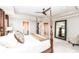 Spacious main bedroom with a walk-in closet, ensuite bathroom, and a decorative full-length mirror at 6379 Fairfield St, Whitestown, IN 46075