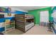 Cozy room with custom-built bunk beds, fun color accents, and whimsical decorations at 6476 W Mulberry Way, Greenfield, IN 46140