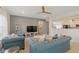 Inviting living room boasts modern furnishings, neutral walls, and a cozy atmosphere at 6476 W Mulberry Way, Greenfield, IN 46140