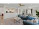 Bright and airy living space connects the kitchen, dining, and living areas seamlessly at 6476 W Mulberry Way, Greenfield, IN 46140