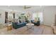 Open-concept living and dining space features modern furnishings and a cohesive color palette at 6476 W Mulberry Way, Greenfield, IN 46140