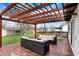 Inviting back deck with pergola, perfect for outdoor entertaining and relaxation at 676 Nelson Dr, Mooresville, IN 46158