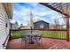 Back deck with seating and dining, perfect for enjoying outdoor space at 676 Nelson Dr, Mooresville, IN 46158