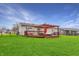 Spacious backyard featuring a deck and patio, ideal for outdoor enjoyment and relaxation at 676 Nelson Dr, Mooresville, IN 46158
