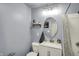 Bright bathroom features a modern vanity and shower at 676 Nelson Dr, Mooresville, IN 46158
