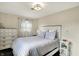 Bright bedroom featuring a comfy bed, dresser, and natural light at 676 Nelson Dr, Mooresville, IN 46158