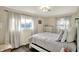 Bright bedroom with natural light, soft textures and neutral color palette at 676 Nelson Dr, Mooresville, IN 46158