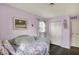 Comfortable bedroom with closet, wood floors, and stylish furnishings at 676 Nelson Dr, Mooresville, IN 46158