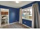 Cozy bedroom with natural light, window, and view to deck at 676 Nelson Dr, Mooresville, IN 46158
