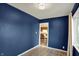 Cozy bedroom with natural light, painted blue at 676 Nelson Dr, Mooresville, IN 46158