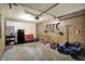 Spacious garage featuring storage, seating, and ample room for vehicles and equipment at 676 Nelson Dr, Mooresville, IN 46158
