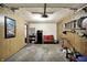 Spacious garage features a mini-fridge and work or storage area at 676 Nelson Dr, Mooresville, IN 46158