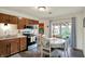 Cozy kitchen with a dining table and updated appliances at 676 Nelson Dr, Mooresville, IN 46158