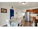 Inviting eat-in kitchen with stainless steel appliances and a view to other rooms at 676 Nelson Dr, Mooresville, IN 46158