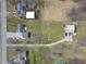 Aerial view of the house showing the layout of the neighborhood and the barn at 7212 E Rocklane Rd, Needham, IN 46162